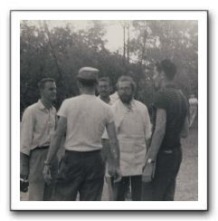 "Rabbi Akiva Greenberg (with beard) at camp"